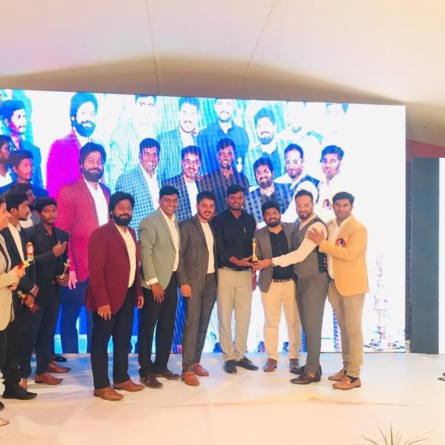 CGO team on stage at an event
